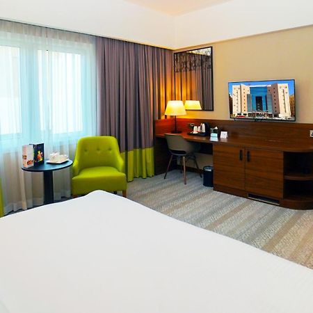 The Grand Lux Hotel Doha Ngoại thất bức ảnh A room at the hotel