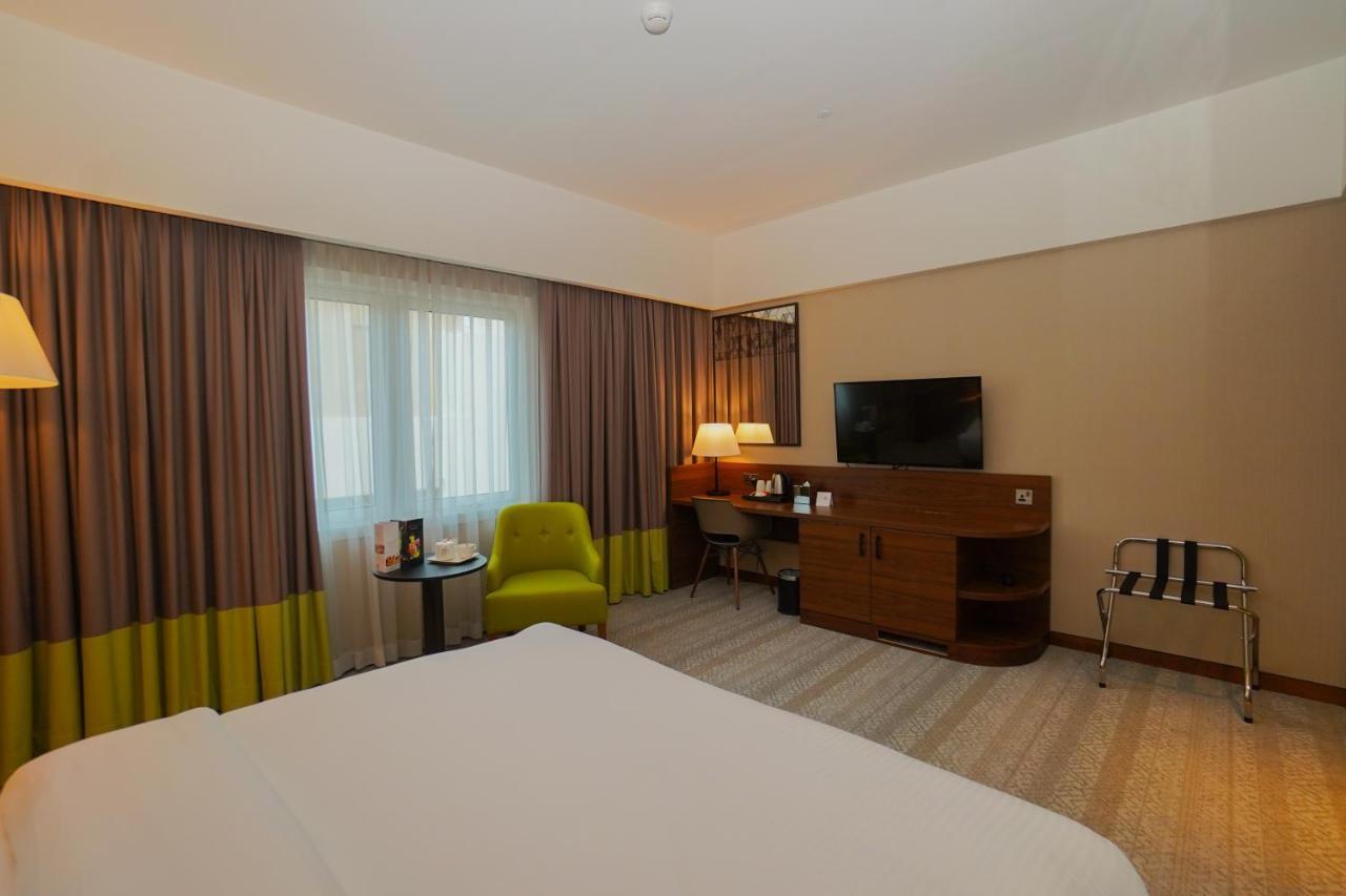 The Grand Lux Hotel Doha Ngoại thất bức ảnh A room at the hotel
