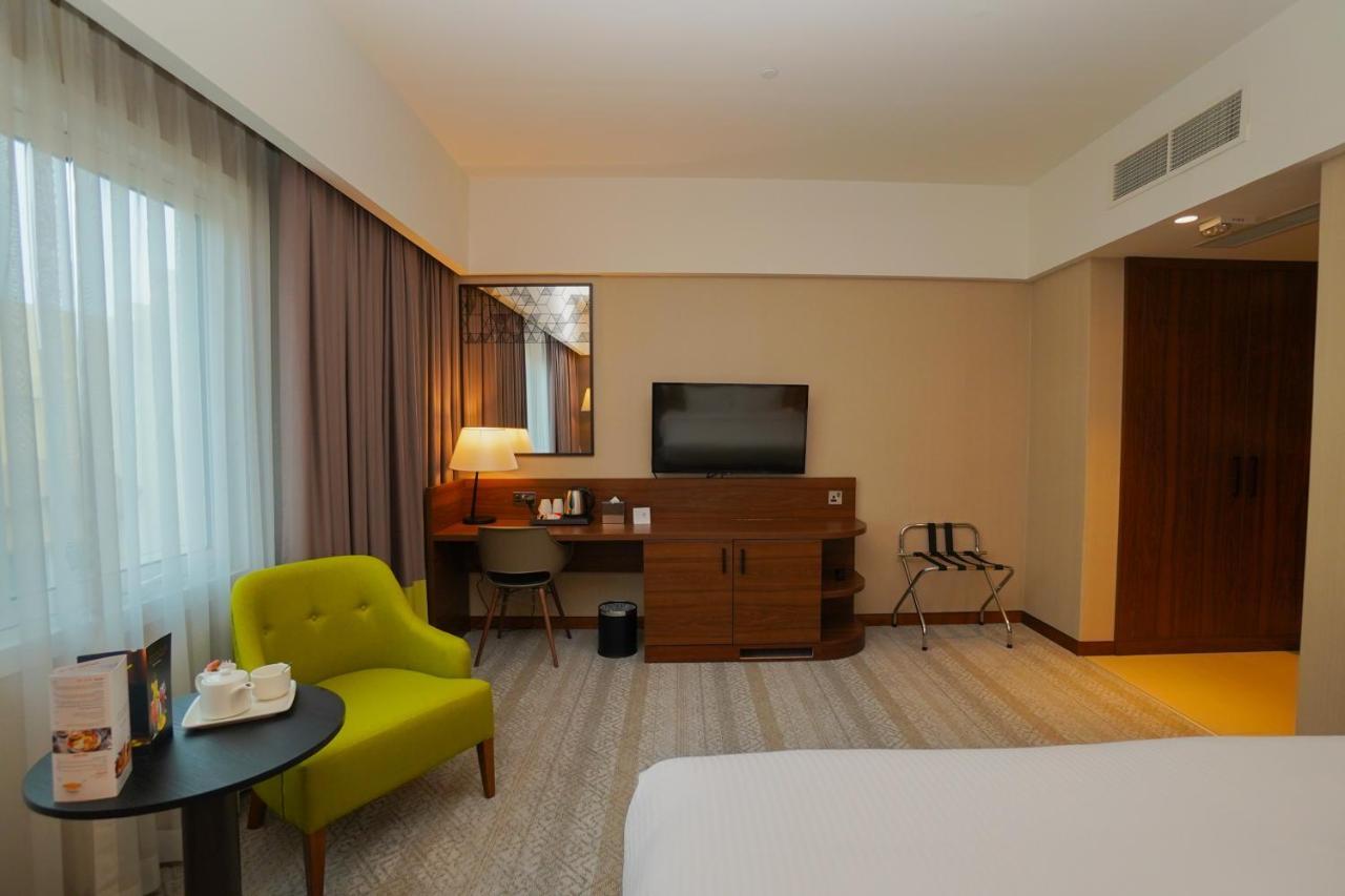 The Grand Lux Hotel Doha Ngoại thất bức ảnh A room at the hotel