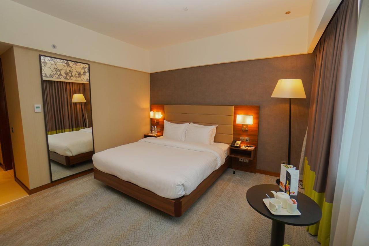 The Grand Lux Hotel Doha Ngoại thất bức ảnh A room at the hotel
