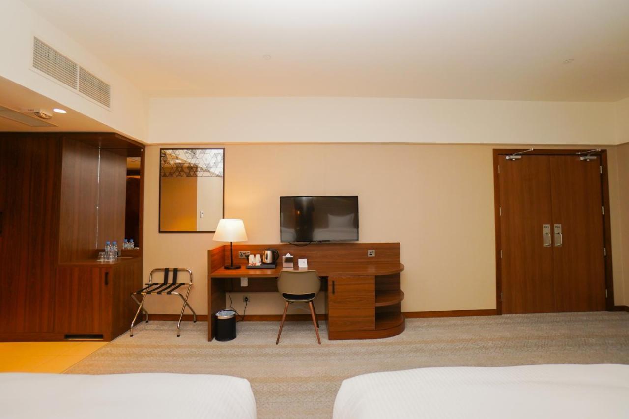 The Grand Lux Hotel Doha Ngoại thất bức ảnh A room at the hotel