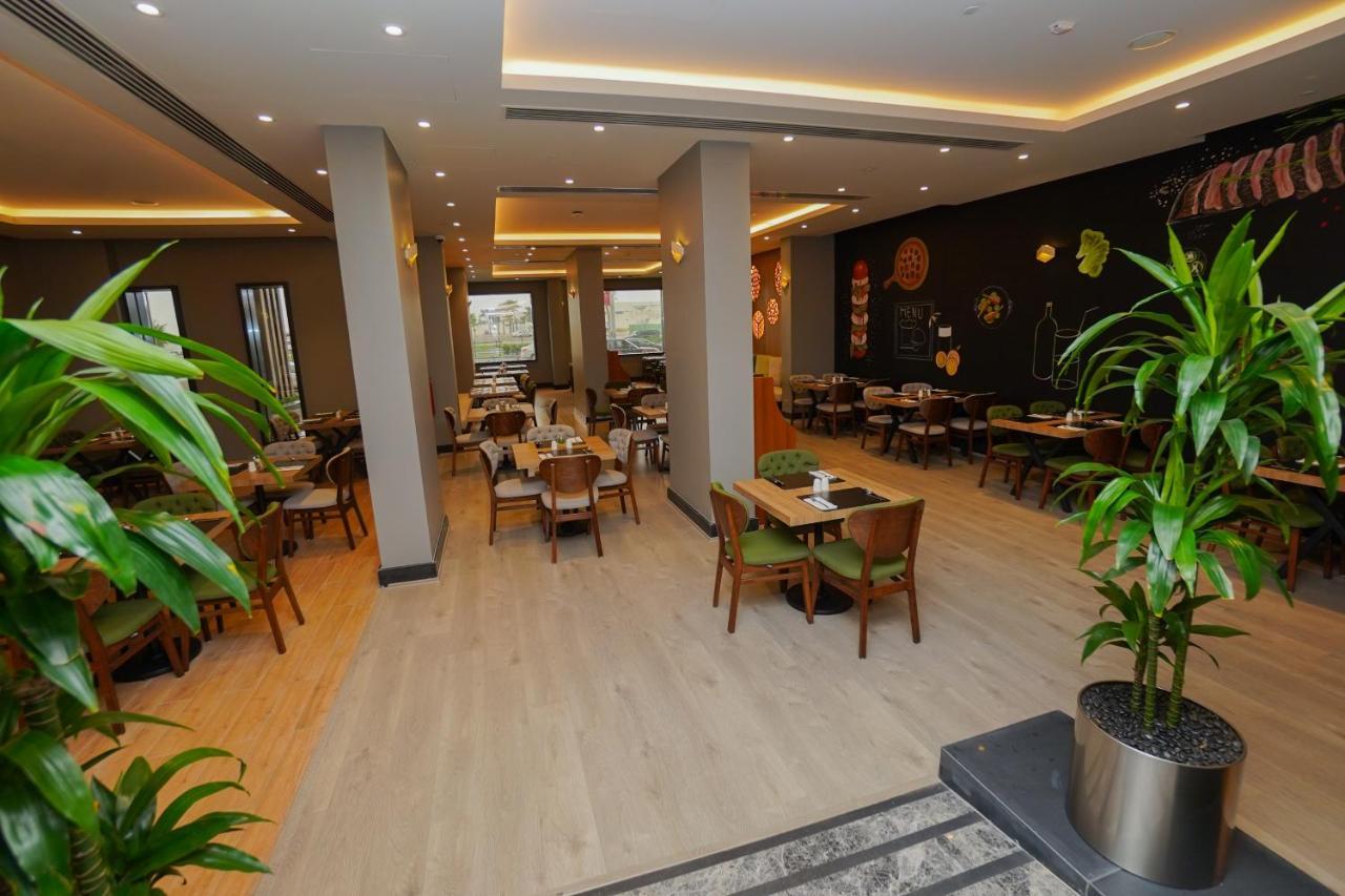 The Grand Lux Hotel Doha Ngoại thất bức ảnh Restaurant