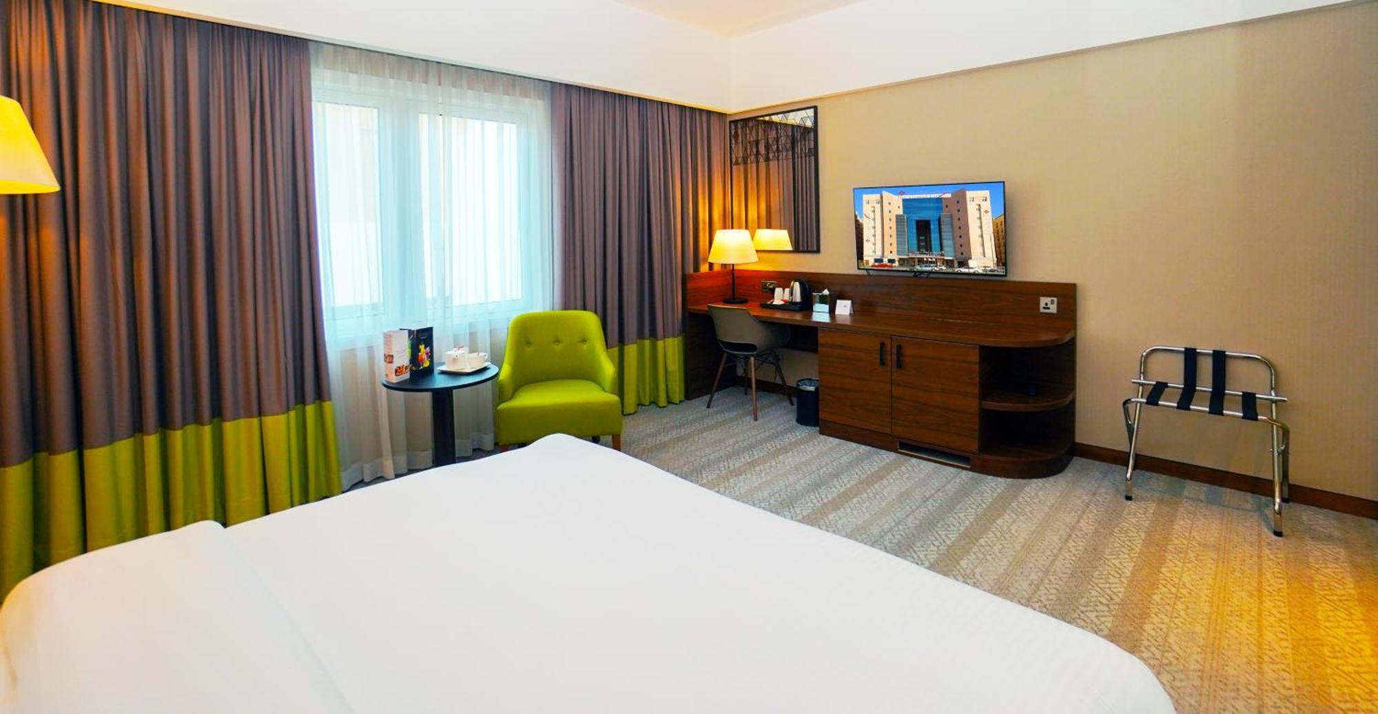 The Grand Lux Hotel Doha Ngoại thất bức ảnh A room at the hotel